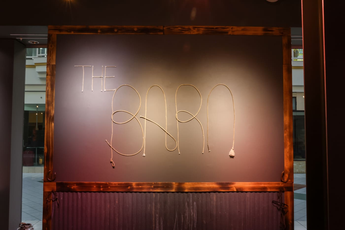 The Barn rope lettering sign at the entrance